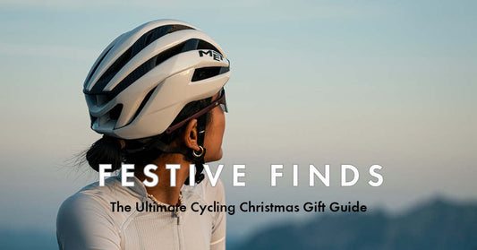 Bicycle Centre Christmas gift guide - festive finds for every rider. Lady wearing a met helmet looking out into the distance. Best bike shop near you Bicycle Centre, Shop the best bikes, helmets and accessories.